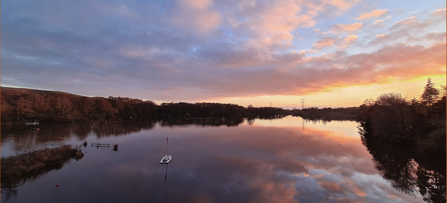 Quiet lakeside views and trees at Cleveleymere